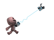 Sackboy using the Grappling Hook.