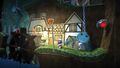 A screenshot of the waterwheel and hovel in the level. Official screenshot from the LittleBigPlanet Website.[1]