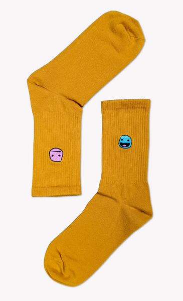 File:InsertCoin Sackboys Feels Socks Gold.jpg